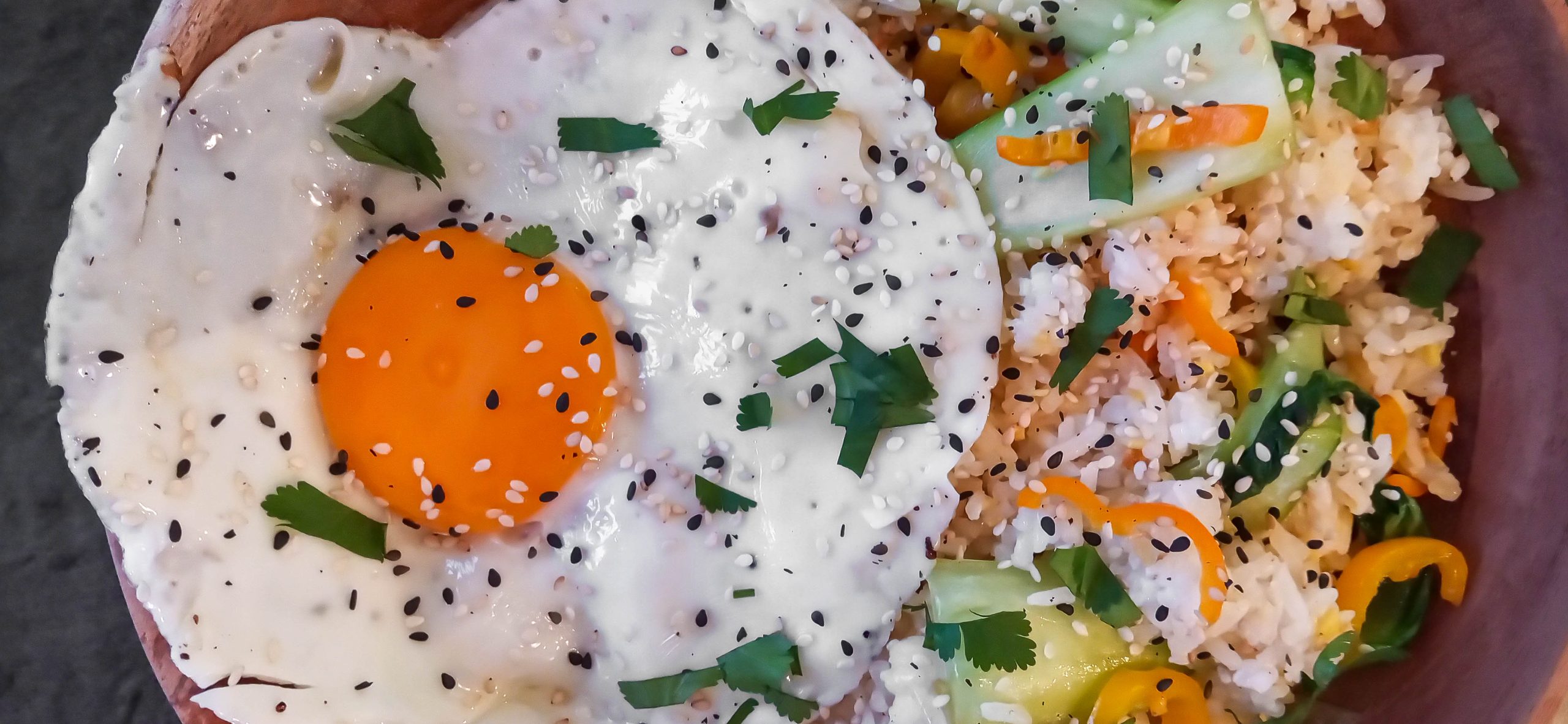 Fried rice with vegetables and fried egg